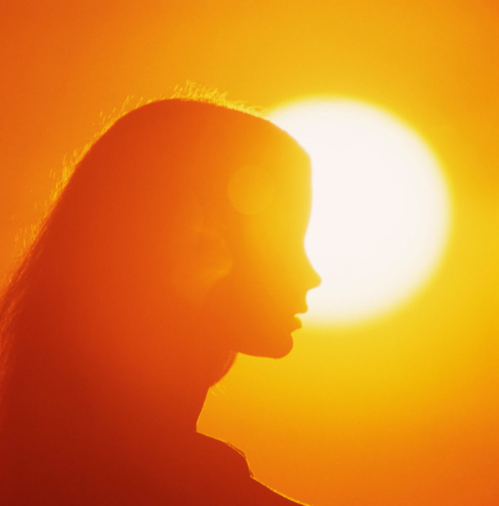 Silhouette of Woman in Profile at Sunset